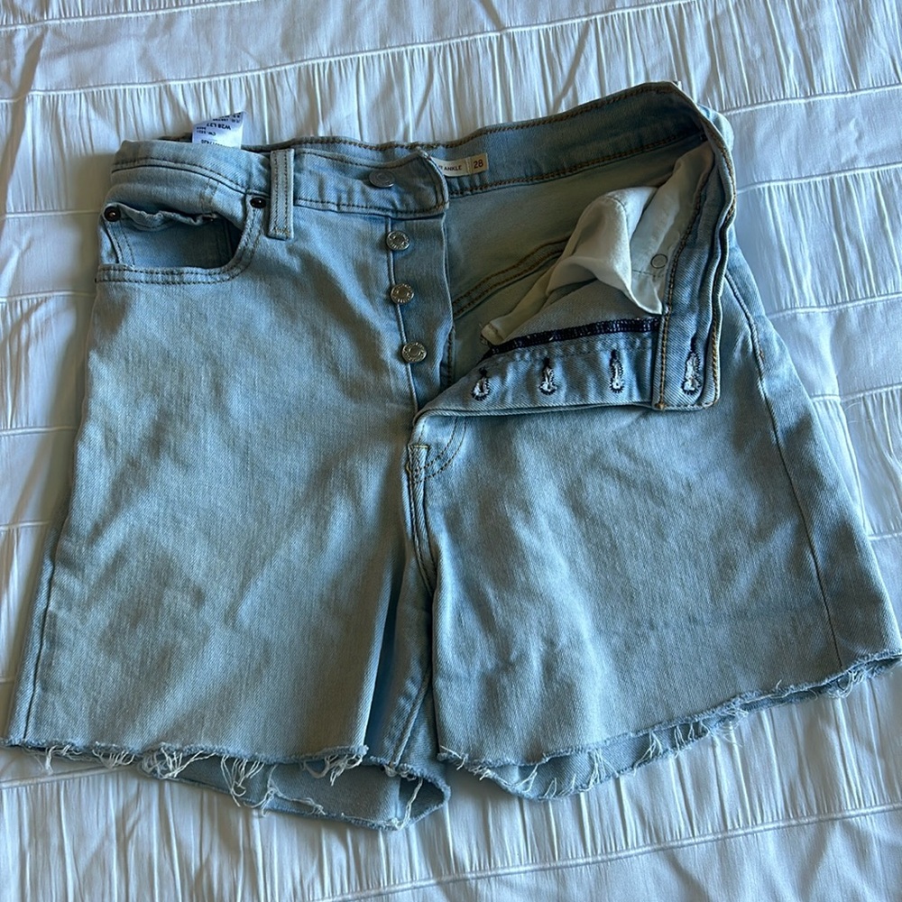 Women’s Levi jeans cut into shorts. Size 28.